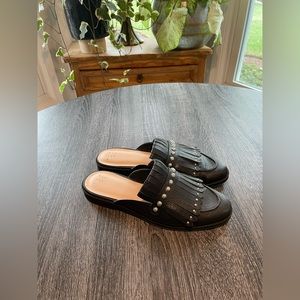 Black leather loafers